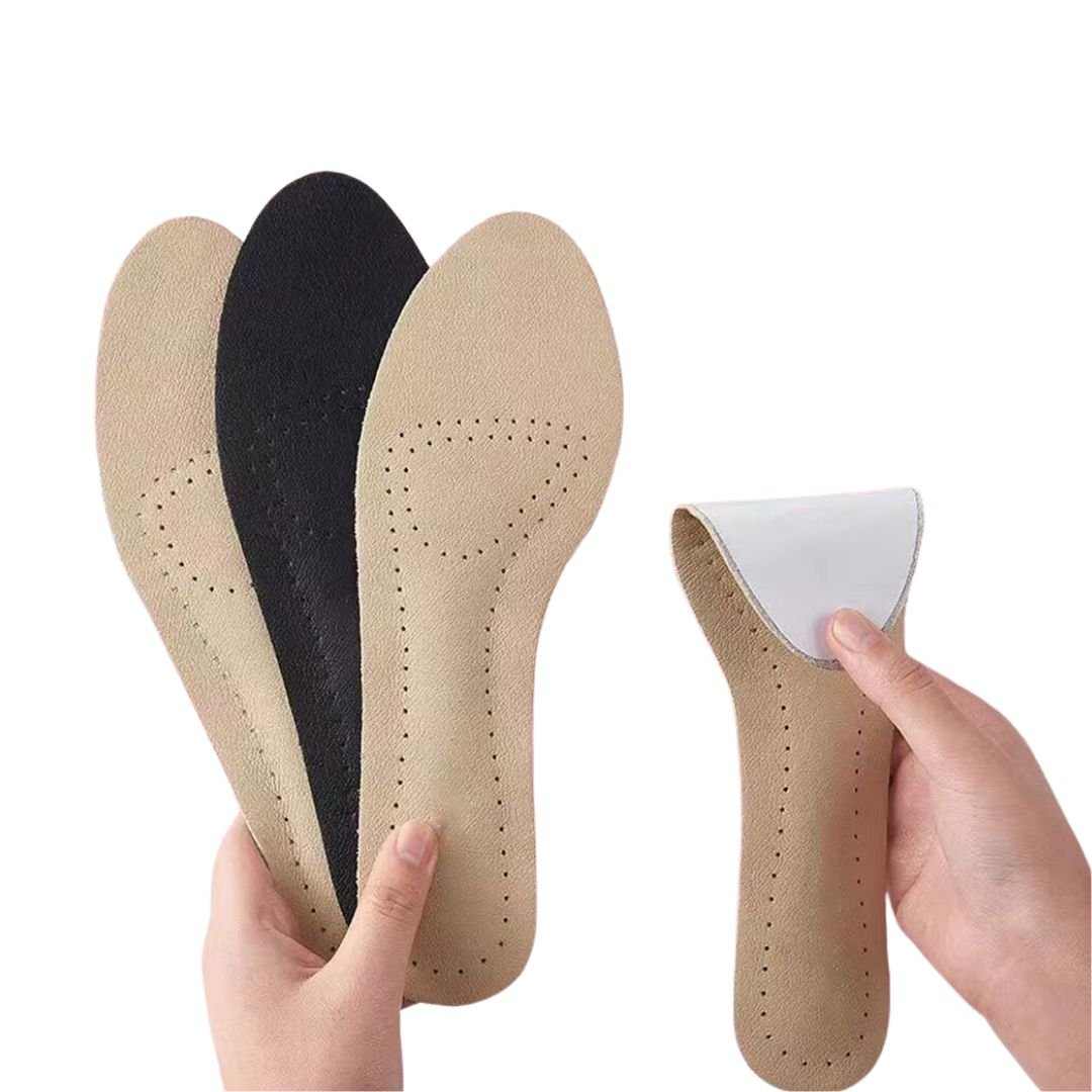 Nude leather half insoles placed in high heels under the ball of the foot