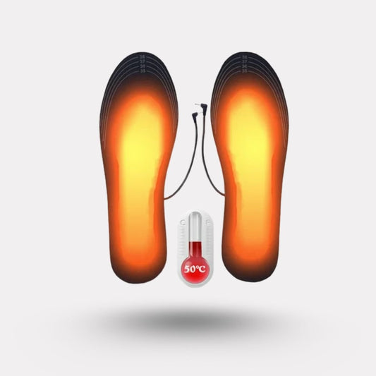 Electric heated insoles with a warming element under the foot, slipped inside work boots