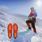 Heated insoles that warm the sole of the foot, sized to sit inside hiking and hunting boots