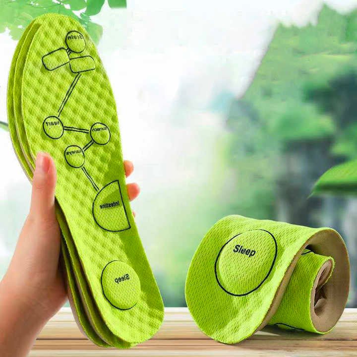 Magnetic acupressure insoles with raised massage points, in green and gray pairs