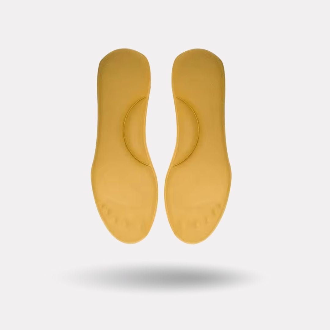 Pink and yellow thermal insoles with an insulating top layer, trimmed to fit inside winter boots