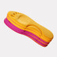Pink and yellow thermal insoles with an insulating top layer, trimmed to fit inside winter boots