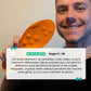 Pair of memory foam orthopedic insoles with a raised arch, worn inside the shoe
