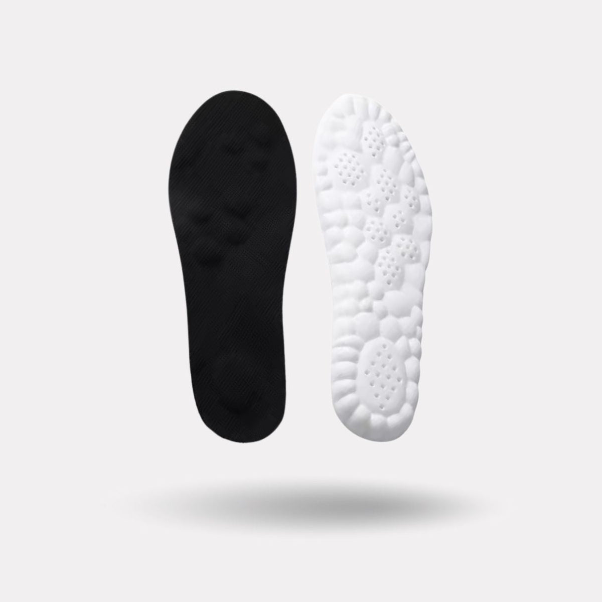 Pair of memory foam orthopedic insoles with a raised arch, worn inside the shoe