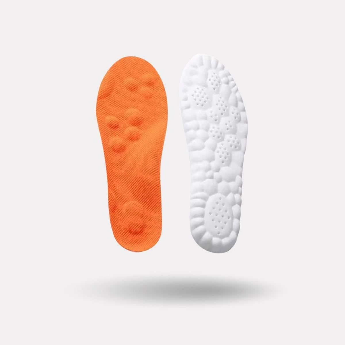 Pair of memory foam orthopedic insoles with a raised arch, worn inside the shoe