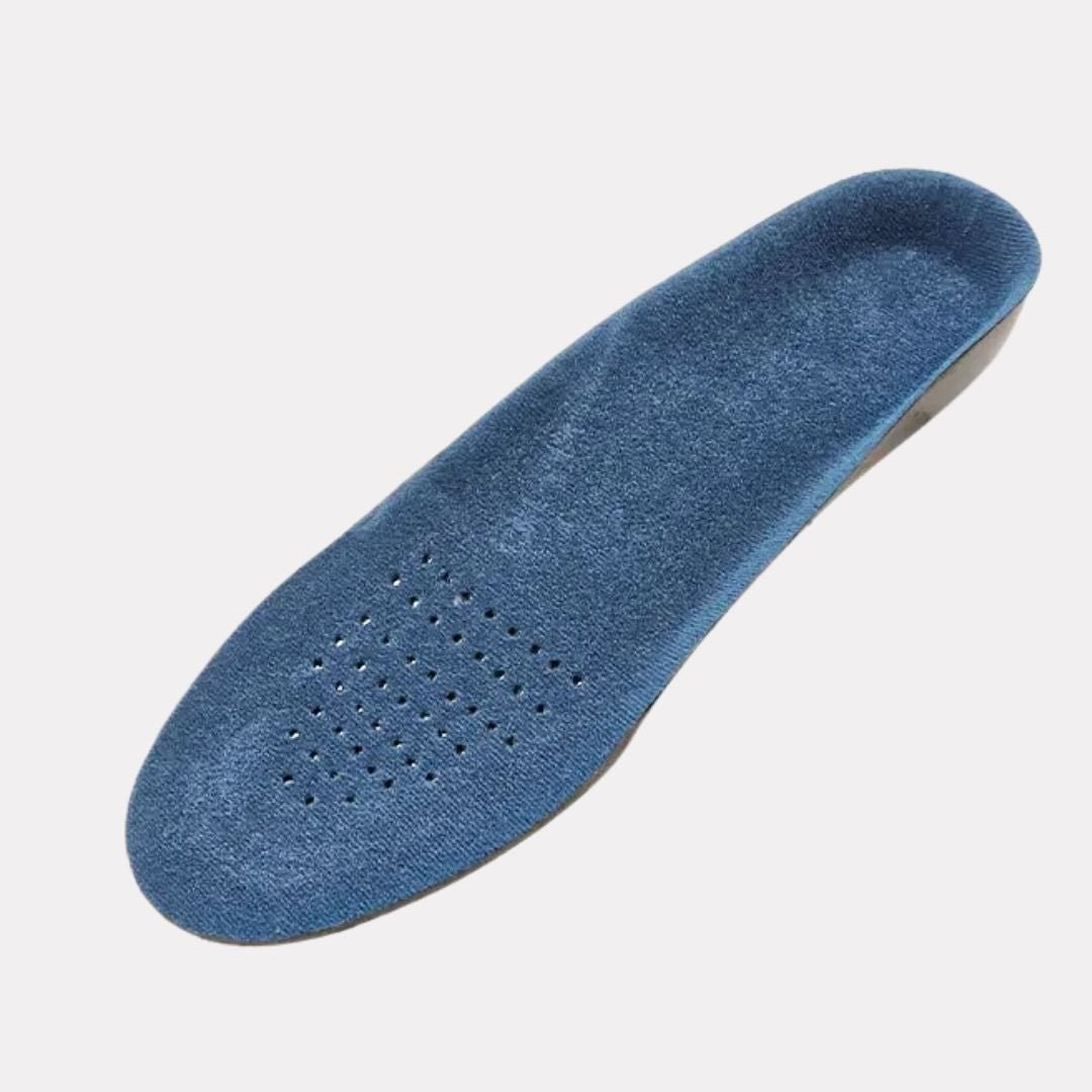 Pair of breathable orthopedic insoles with a raised arch, worn inside the shoe