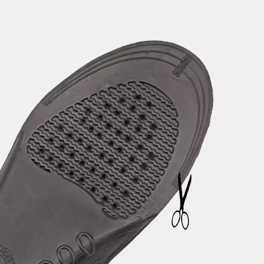 Pair of breathable orthopedic insoles with a raised arch, worn inside the shoe