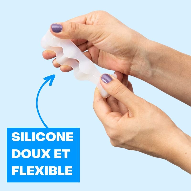 Soft silicone toe separators slotted between the toes to spread them apart