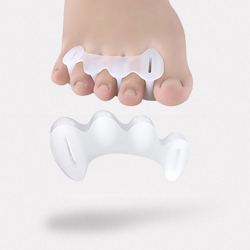 Soft silicone toe separators slotted between the toes to spread them apart