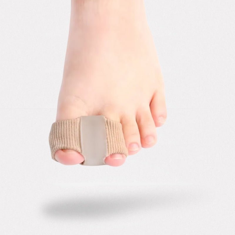 Soft flexible separators slipped between the toes to ease a hammer toe