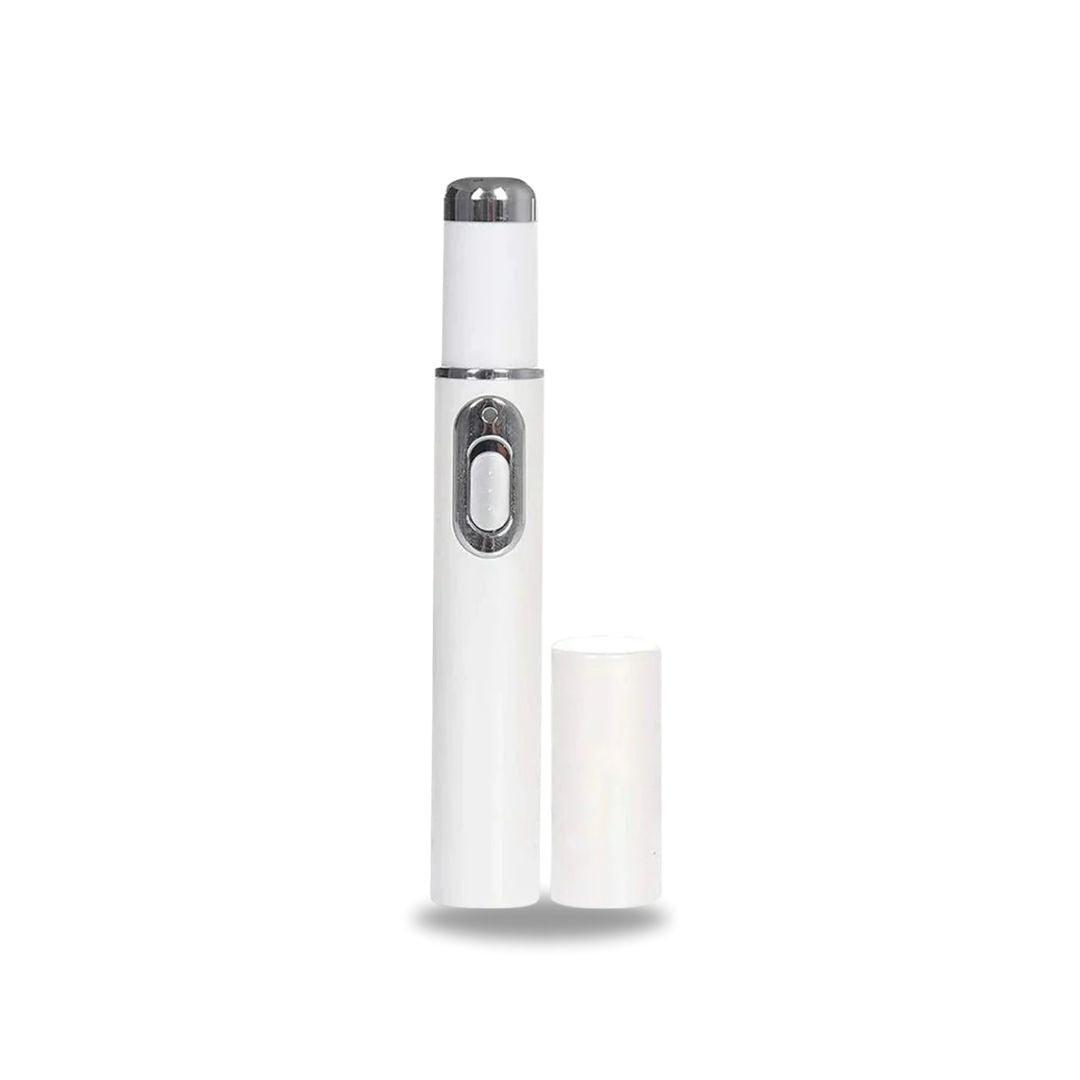 Handheld laser pen held over the toenail to treat nail fungus at home