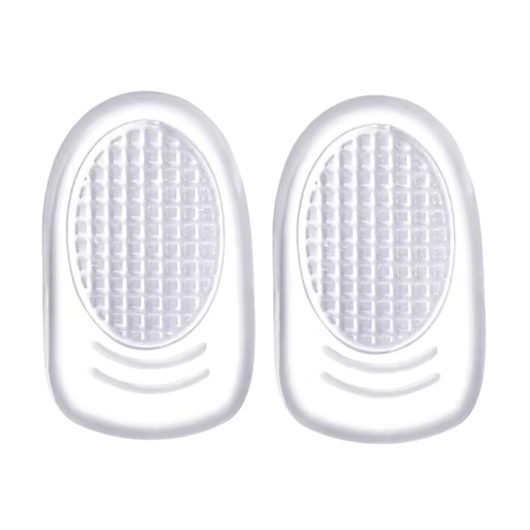 Clear padded cushions lining the heel of a shoe with a non-slip grip