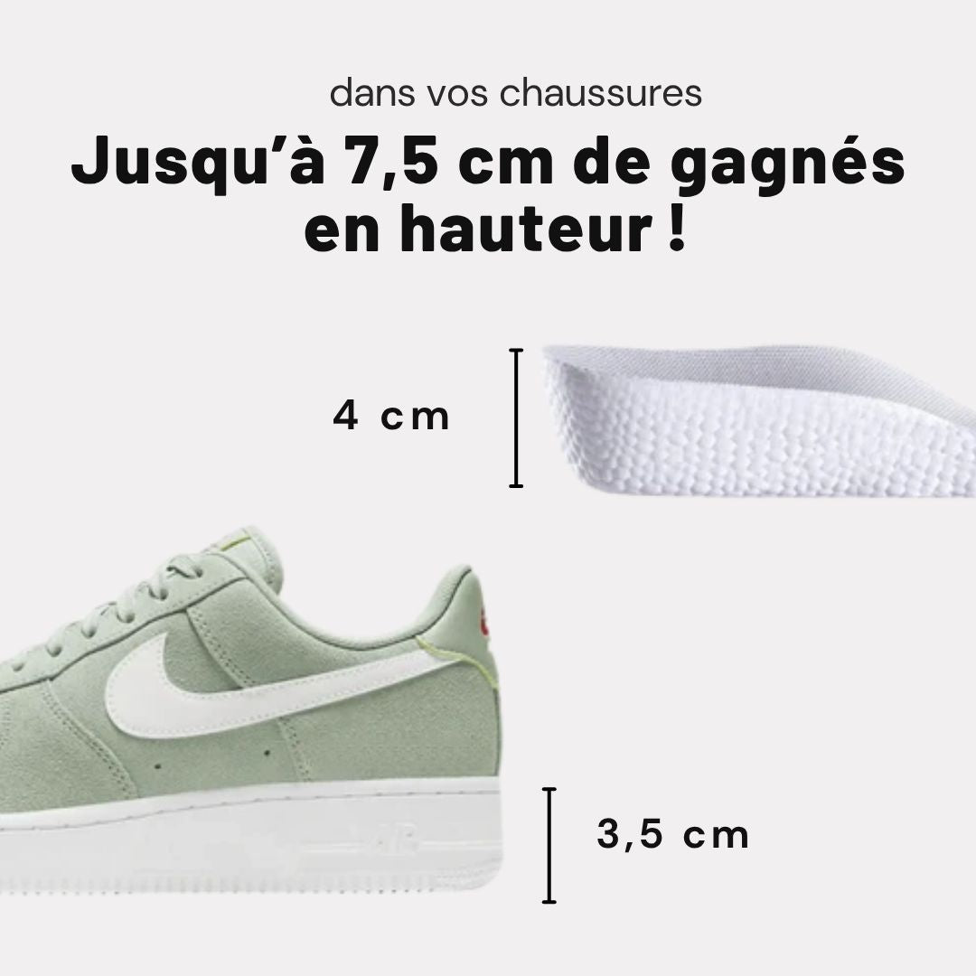 Pair of invisible height increase heel lifts placed under the heel inside the shoe