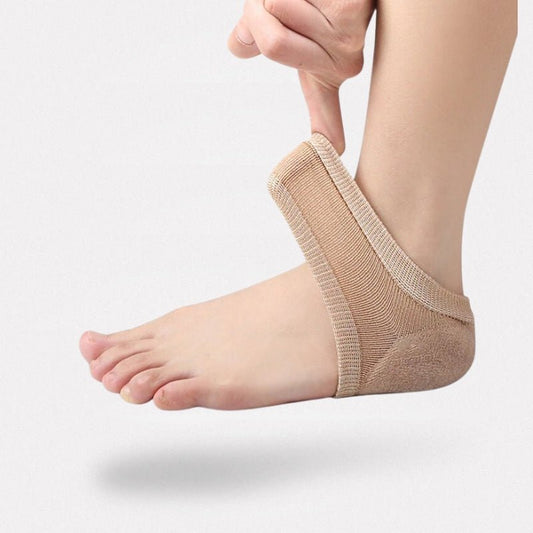 Pair of gel heel cushions placed under the heel inside any shoe