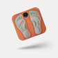 Foot massage mat covered in raised stimulation points, stood on barefoot